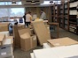Library staff among boxes in Meyer.jpg